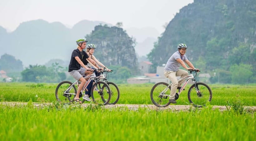 Hanoi: Ninh Binh, Bai Dinh/Hoa Lu, Trang An, & Mua Cave Tour - Guides, weather, and the human side of the day
