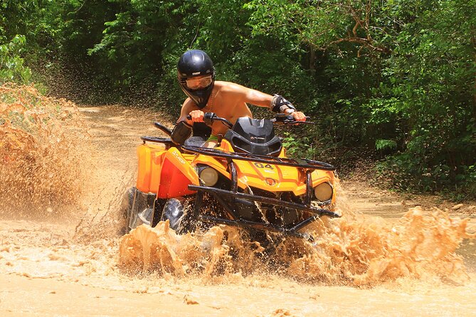 Hidden Cenote Swim & ATV Jungle Adventure with Transportation - Cooling off in an open-air cenote