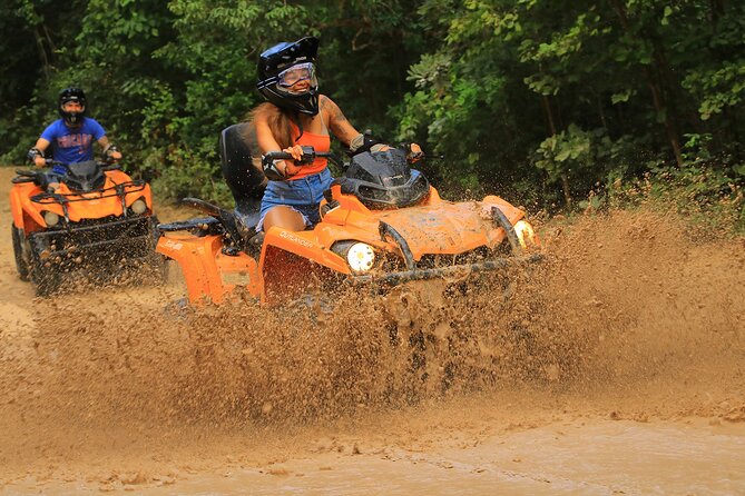 Hidden Cenote Swim & ATV Jungle Adventure with Transportation - Riding a Can-Am Outlander through the trees