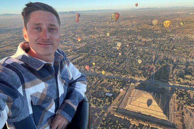 Hot Air Balloon Flight with Breakfast Cave and Pyramids Tour - Walking the Teotihuacan pyramids with a guide