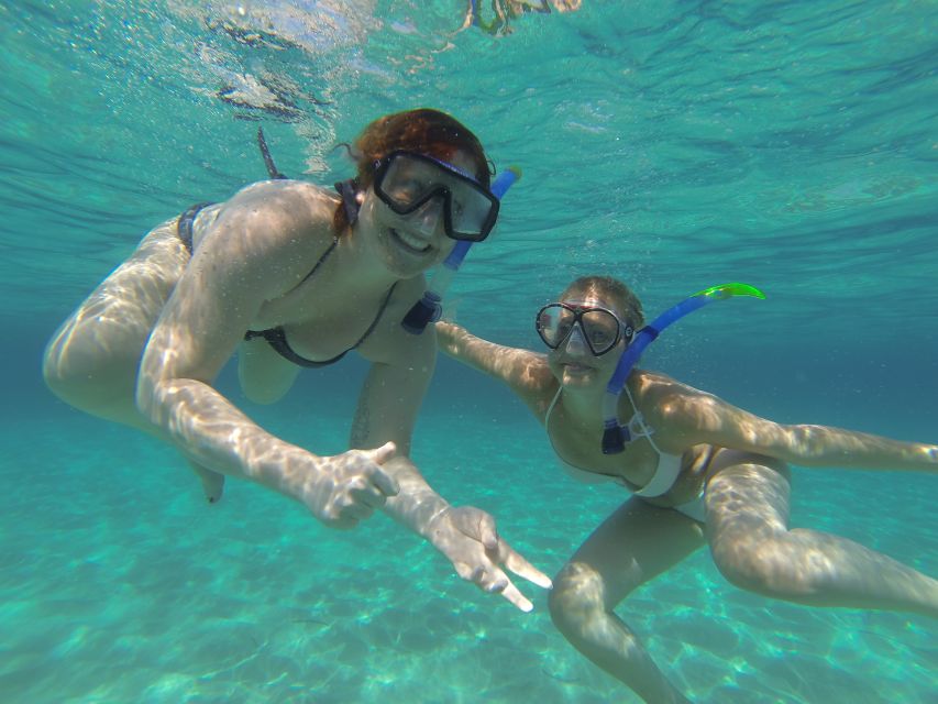 Ibiza: Snorkeling and SUP Paddle, Beach and Cave Tour - Drinks, music, and the practical value of the boat ride