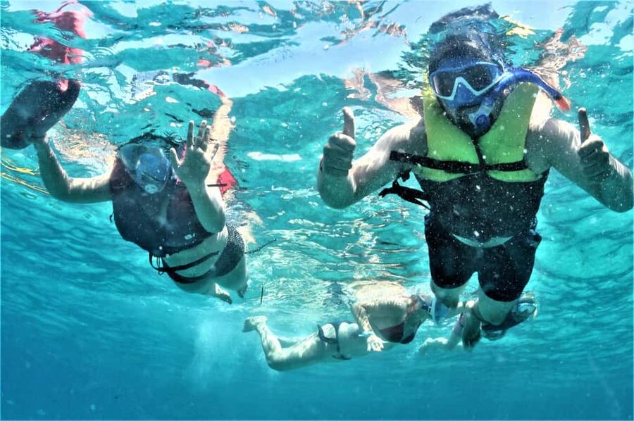 Ibiza: Snorkeling, Sunset Beach and Cave Boat Trip - Snorkeling, paddleboards, and the optional cave