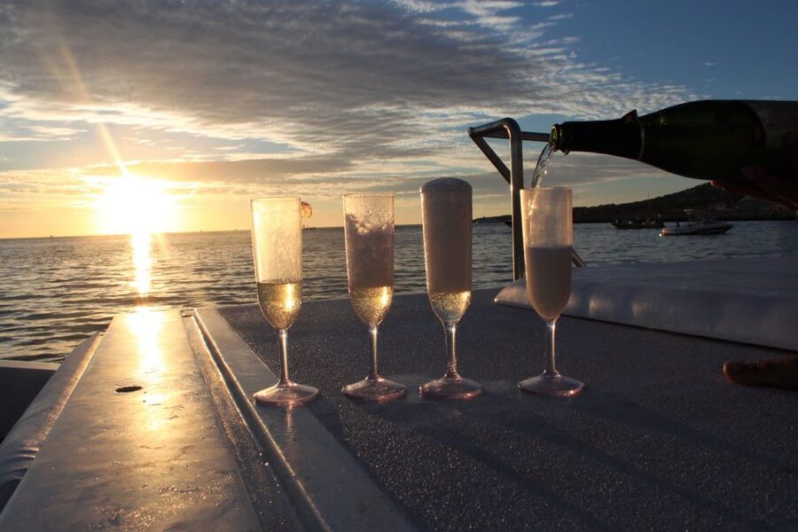 Ibiza: Snorkeling, Sunset Beach and Cave Boat Trip - Sunset from the water