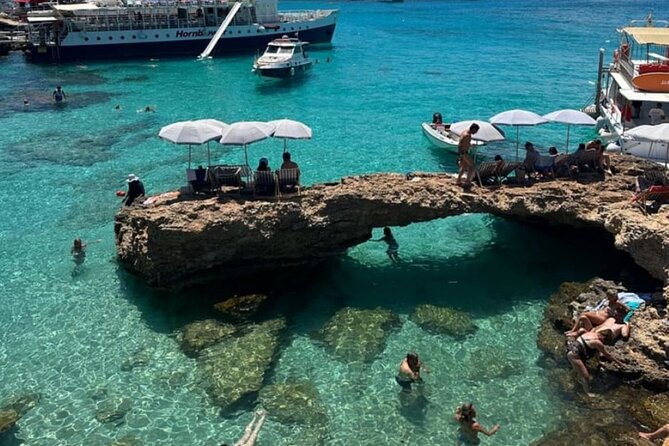 Malta: Blue lagoon, Gozo, Comino & Crystal Lagoon Sea Caves - Blue Lagoon: beautiful water, busy shoreline