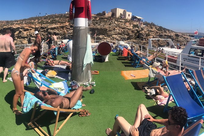Malta: Comino, Blue Lagoon & Caves - swim, snorkel & slide - Ahrax Cave, Coral Cove, and Comino’s cliffs