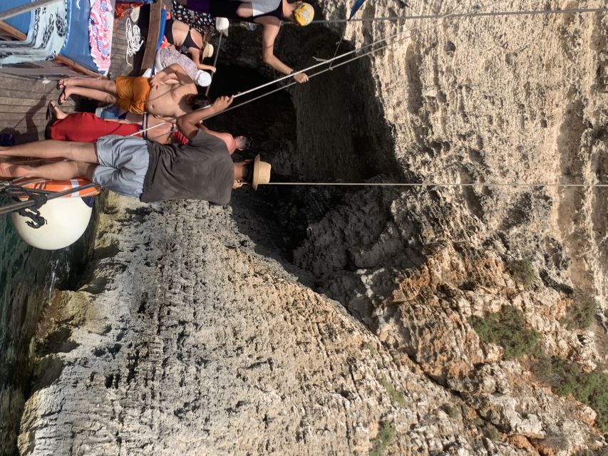 Malta: Comino, Santa Maria Bay, Blue Lagoon & Sea Caves Tour - Food, Music, and Comfort on Board