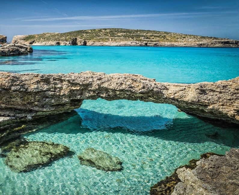 Malta: Private Boat Cruise with Caves, Beaches & Swim Stops - Comino’s caves and rock formations
