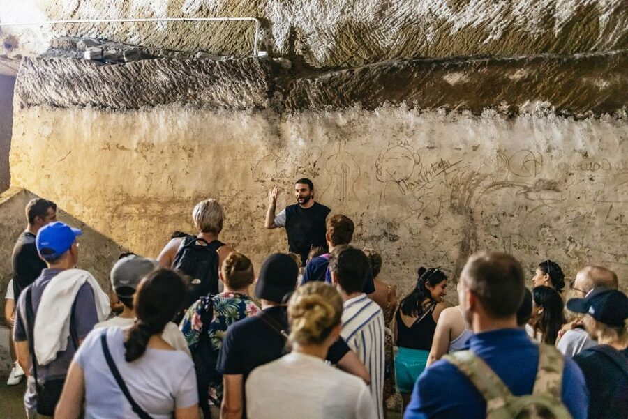 Naples: Spanish Quarters Underground Guided Tour - Entering the tunnels near Toledo Street