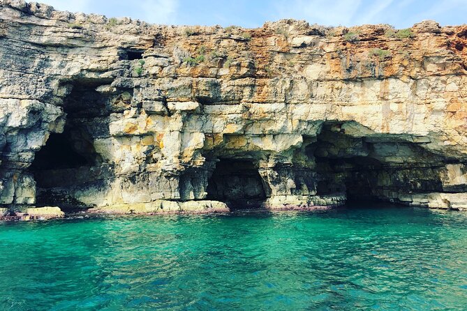 Polignano a Mare boat tour emotions, caves, diving and appetizers - The swim stop, snorkeling, and onboard shower