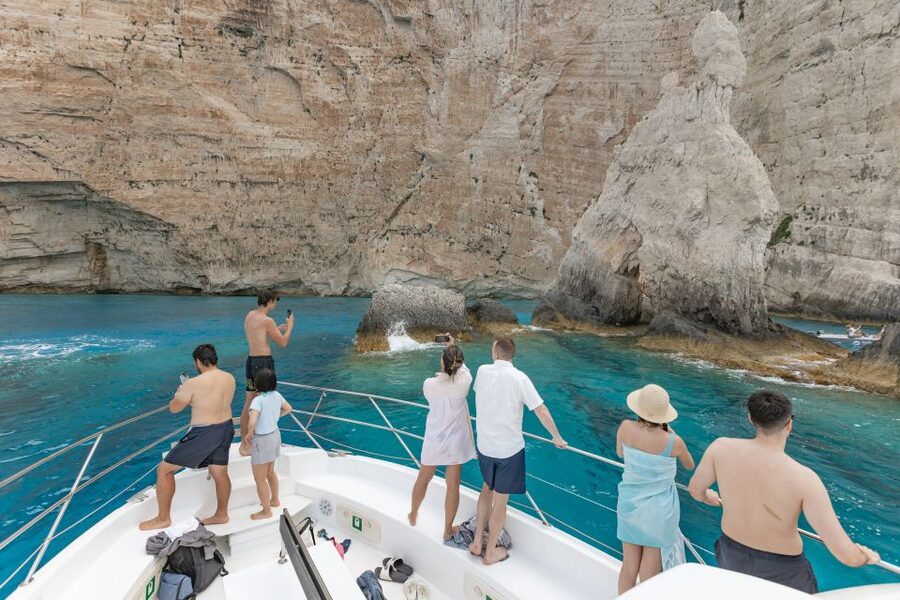 Porto Vromi: Shipwreck, Caves, & White Beach Swimming Cruise - Blue caves and careful boat handling
