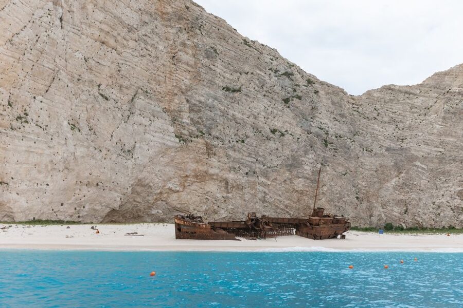 Porto Vromi: Shipwreck, Caves, & White Beach Swimming Cruise - Three swimming stops in clear water
