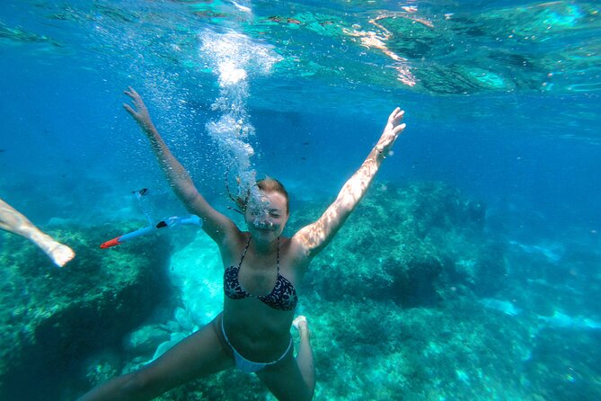 Private Boat Tour to Blue Lagoon Comino Caves and Gozo - Passing Cominotto and its small coves