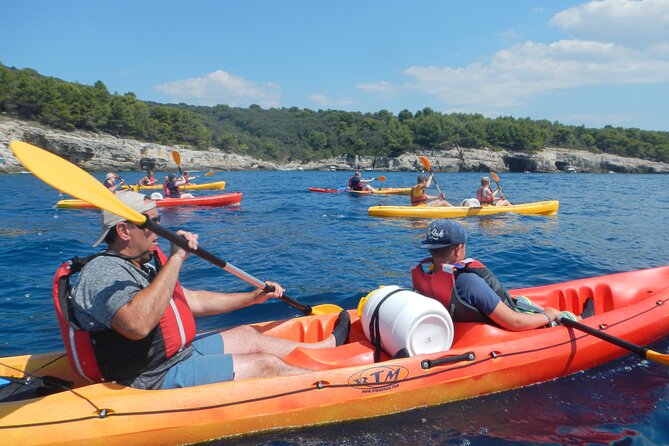 Pula Kayak, Cliffs & Snorkeling Adventure - Paddling toward Pula’s cliffs and military coast
