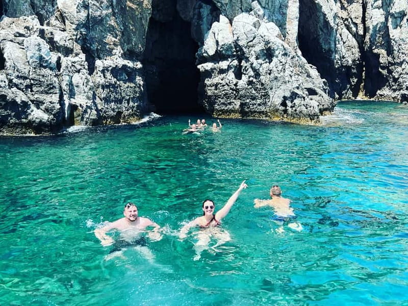 Rhodes: Anthony Quinn Bay & Sea Caves Snorkeling Cruise - Traganou’s gravel shore and rocky caverns