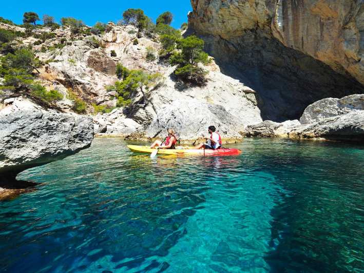 Sant Elm: Guided kayak tour to Cala en Tío with caves - Weather is part of the experience