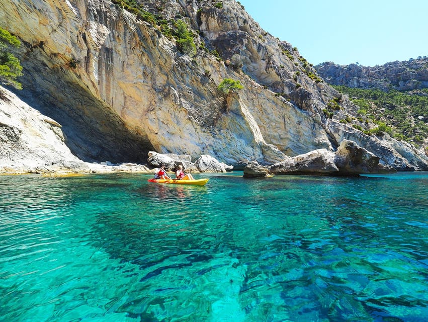 Sant Elm: Guided kayak tour to Cala en Tío with caves - The coast toward Punta de na Galinda