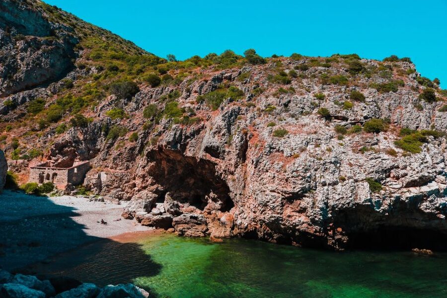Sesimbra: Arrábida Beaches & Caves Boat Tour with Snorkeling - Leaving Sesimbra with the coast ahead