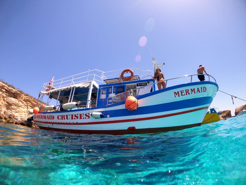 St Paul's Bay: Comino, Blue Lagoon, Gozo, & Caves Boat Tour - Leaving Bugibba and following Malta’s rocky coast