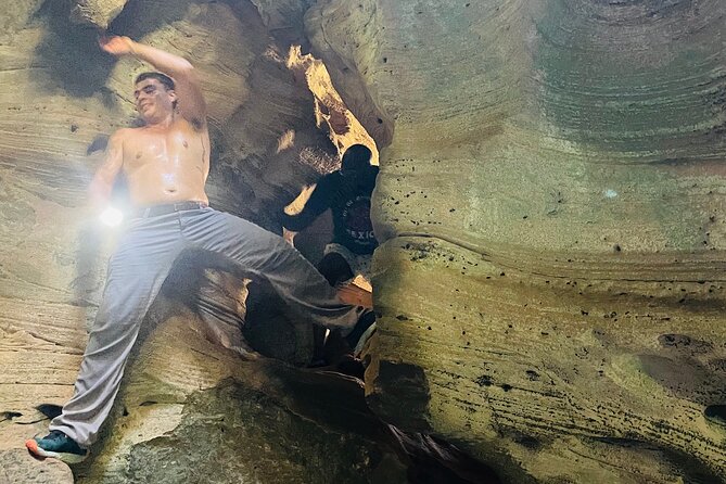 Taino Indian Cave, Arecibo Hike and Beach Tour from San Juan - Entering the cave and finding Taino carvings