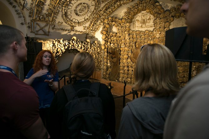 The Original Roman Crypts and Catacombs Tour with Transfers - How the timing and group size affect the experience