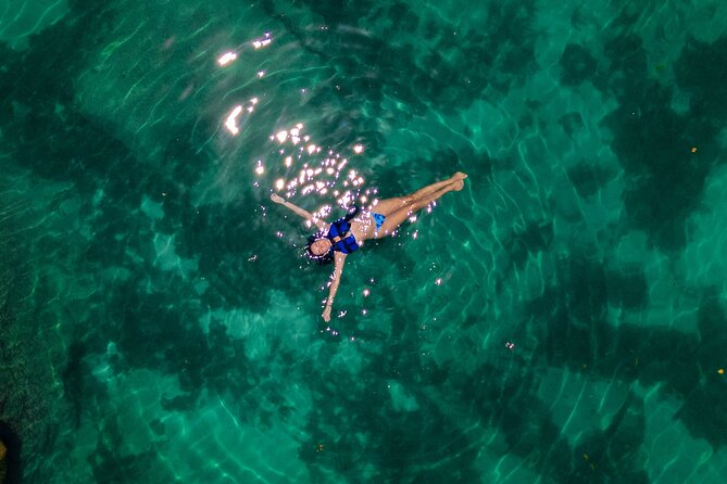 Tulum Guided Tour, Magical Cenote, Lagoon Snorkeling and Beachside Lunch - Transport, group size, and the real length of the day