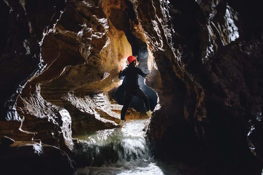 Waitomo Caves Black Abyss Ultimate Caving Experience - Check-in, equipment, and the first safety lesson