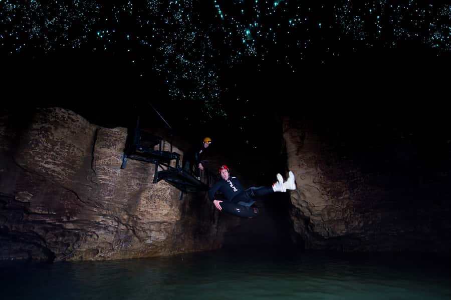 Waitomo Caves: Labyrinth Black Water Rafting Experience - Scrambling through Ruakuri Cave
