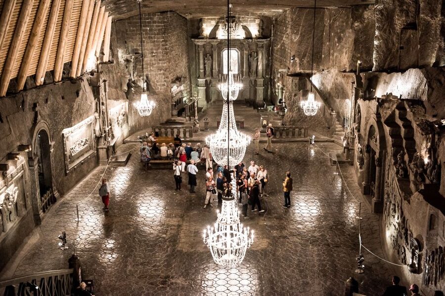 Wieliczka Salt Mine Tour Including Hotel Pick-Up - Salt statues, mining tools, and working life